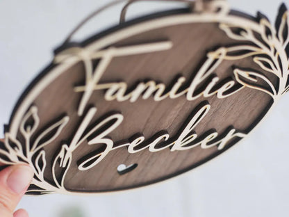 Personalisiertes Holzschild Familie rund mit Namen